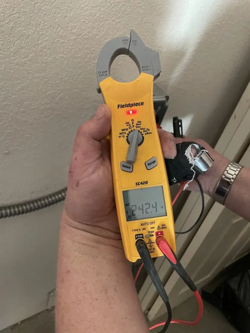 Voltage testing with clamp meter during Aluminum Wiring Replacement in Pasadena